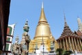 Temple of Emerald Buddha Wat Phra Kaew with Guardian Giants standing in Bangkok, Thailand. Is the grand palace.