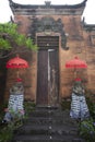 Temple entrance with bedogol guardian carved stone statues in Bali, Indonesia.