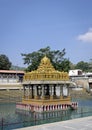 Temple with golden dome in holy water pond at Tirupati, Andra Pradesh, India Royalty Free Stock Photo