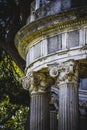 Temple, Greek-style columns, Corinthian capitals in a park Royalty Free Stock Photo