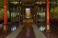 Temple Interior with a Golden Kuan Yin Statue in Bangkok Royalty Free Stock Photo