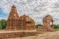 Stone carved erotic bas relief in Hindu temple in Khajuraho, India. Royalty Free Stock Photo