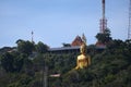 temple landscape on the mountain, big golden Buddha statue, beautiful, is a tourist attraction in Thailand.