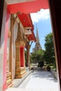 Through an arch Wat Chalon Phuket Thailand