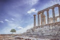 The Temple of Poseidon and a tree. Cape Sounion, Greece. Soft focus Royalty Free Stock Photo