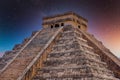 Temple Pyramid of Kukulcan El Castillo, Chichen Itza, Yucatan, Mexico, Maya civilization with Milky Way Galaxy stars night sky Royalty Free Stock Photo