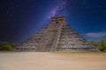 Temple Pyramid of Kukulcan El Castillo with Milky Way Galaxy stars night sky, Chichen Itza, Yucatan, Mexico, Maya civilization Royalty Free Stock Photo