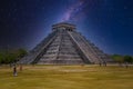 Temple Pyramid of Kukulcan El Castillo with Milky Way Galaxy stars night sky, Chichen Itza, Yucatan, Mexico, Maya civilization Royalty Free Stock Photo