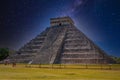 Temple Pyramid of Kukulcan El Castillo with Milky Way Galaxy stars night sky, Chichen Itza, Yucatan, Mexico, Maya civilization Royalty Free Stock Photo