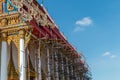 Temple roof vintage Thai style with against blue sky background