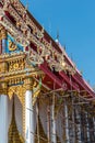 Temple roof vintage Thai style with against blue sky background