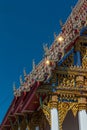 Temple roof vintage Thai style with against blue sky background