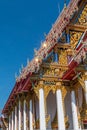 Temple roof vintage Thai style with against blue sky background