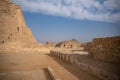 Temple`s ruins around of Step pyramid of Djoser in Saqqara, an archeological remain in the Saqqara necropolis, Egypt Royalty Free Stock Photo