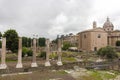 Temple of Saturn columns and view of ancient ruined roman forum, UNESCO world heritage site, Rome, Lazio, Italy, Europe. May 10, Royalty Free Stock Photo