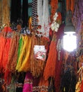 temple shop display of colourful thread and god goddess necklace