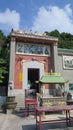 Temple and shrine with incense sticks in Hong Kong fishing village