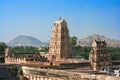 Temple and tower on the sacred Hemakuta hill Royalty Free Stock Photo