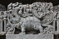 Hoysaleswara Temple wall carved with sculpture of Makara mythical animal carrying lord Varuna god of rain Royalty Free Stock Photo