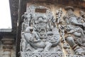 Hoysaleswara Temple Wall carved with sculptures of Lord Brahma god of creation and Lord Ganesha Elephant god