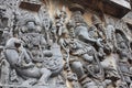 Hoysaleswara Temple Wall carved with sculptures of Lord Brahma god of creation and Lord Ganesha Elephant god