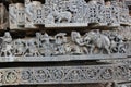 Temple wall carving depicting Battle scene from Mahabharata Indian Hindu Epic