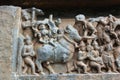 Hoysaleshwara Temple wall carving of Ishana god of northeast direction and water element marching on his bull Royalty Free Stock Photo