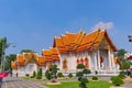 Temple of Wat Benchamabophit, located in Bangkok, Thailand, also known as the Marble Temple. Side front view.