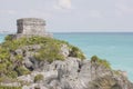 Alone temple on the rocks beside the sea of Tulum, Mexico