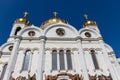The temple, a white wall with domes against the blue sky. Christ the Savior Cathedral in Moscow. Royalty Free Stock Photo
