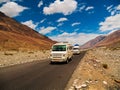 Tempo Traveller, highly used tourist vehicle on Mountain road of Ladakh, Northern India.Beautiful landscape of Ladakh, highest