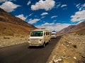Tempo Traveller, highly used tourist vehicle on Mountain road of Ladakh, Northern India.Beautiful landscape of Ladakh, highest