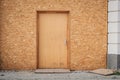 Temporary entrance door , wooden door made of chipboard