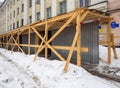 Temporary protected pavement near the reconstructed building Royalty Free Stock Photo