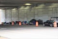 Homeless tents erected under overpass on side of road