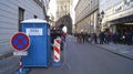 Temporary traffic signs among tourists in the center of Prague.