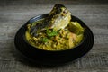 Tempoyak ikan patin with green gravy. Royalty Free Stock Photo