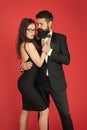 Temptation. sexy couple in love. formanl couple in tuxedo and black dress. elegant fashion and beauty. romantic date