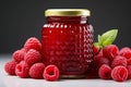 A tempting arrangement of homemade raspberry jam and ripe berries