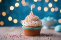 Tempting birthday cupcake displayed on a bright, clean tabletop