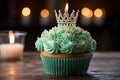 Tempting birthday treat Cupcake with blue candle, heart, and green crown cupcakes