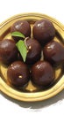 Tempting Black Gulab Jamun, a beloved Indian dessert delight.