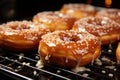 Tempting scene warm glazed donuts on a baking sheet
