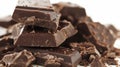 Pieces of Dark Chocolate Sit in a Heap, Waiting to Be Eaten Royalty Free Stock Photo
