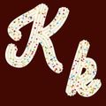 Tempting typography. Font design. 3D letter K of the whipped cream and candy