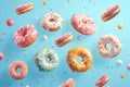 Tempting treats pink donuts adorned with sprinkles against blue backdrop