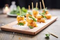 tempura cheesecake bites with powdered sugar