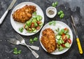 Tempura chicken chop with rice and fresh vegetable salad on a dark background, top view Royalty Free Stock Photo