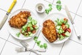 Tempura chicken chop with rice and fresh vegetable salad on a light background, top view. Delicious lunch Royalty Free Stock Photo