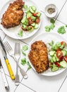 Tempura chicken chop with rice and fresh vegetable salad on a light background, top view. Delicious lunch Royalty Free Stock Photo